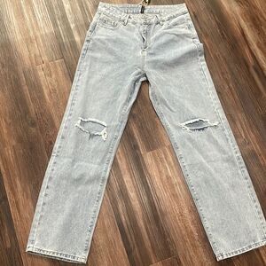 Distressed denim jeans